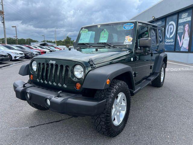 used 2010 Jeep Wrangler Unlimited car, priced at $11,990