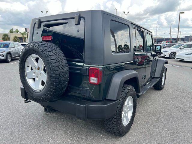 used 2010 Jeep Wrangler Unlimited car, priced at $11,990