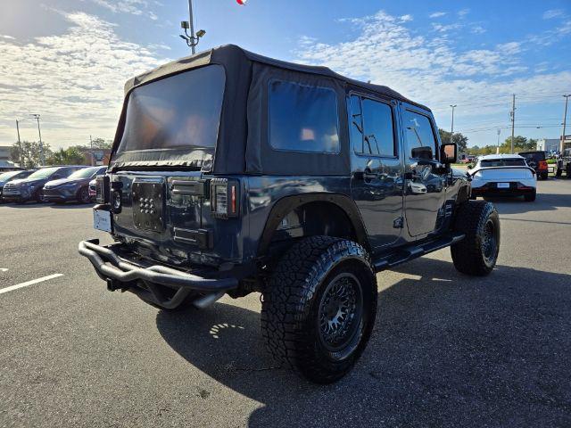 used 2018 Jeep Wrangler JK Unlimited car, priced at $24,875