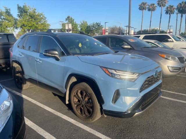 used 2024 Toyota RAV4 Hybrid car, priced at $40,000