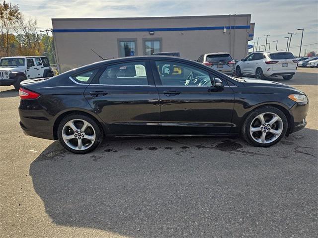 used 2014 Ford Fusion car, priced at $5,910