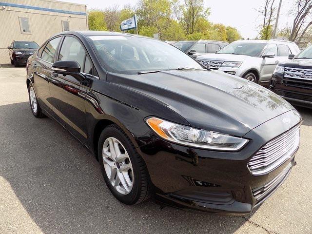 used 2016 Ford Fusion car, priced at $13,511