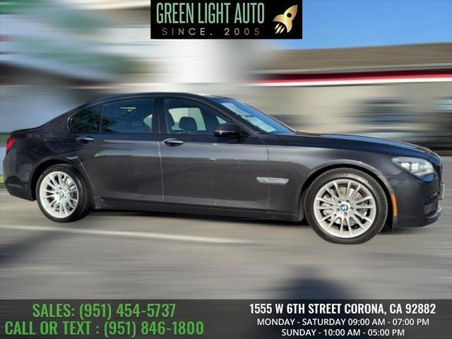used 2015 BMW 740 car, priced at $13,495