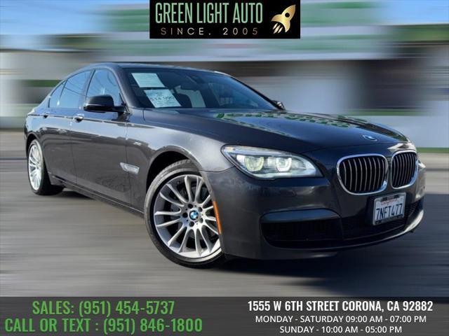 used 2015 BMW 740 car, priced at $13,495