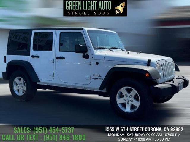 used 2015 Jeep Wrangler Unlimited car, priced at $16,990