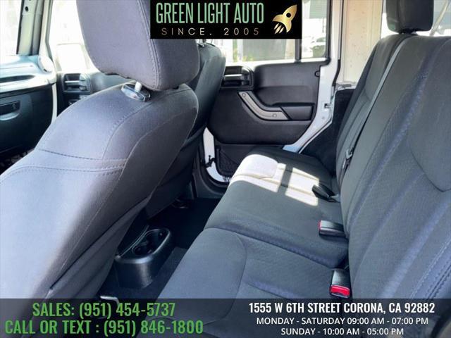 used 2015 Jeep Wrangler Unlimited car, priced at $16,990