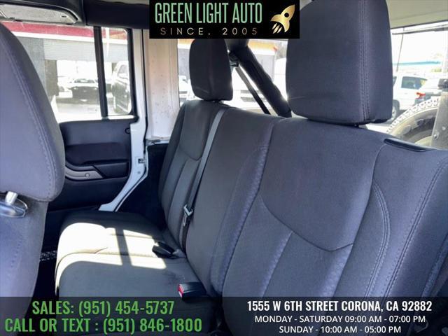 used 2015 Jeep Wrangler Unlimited car, priced at $16,990