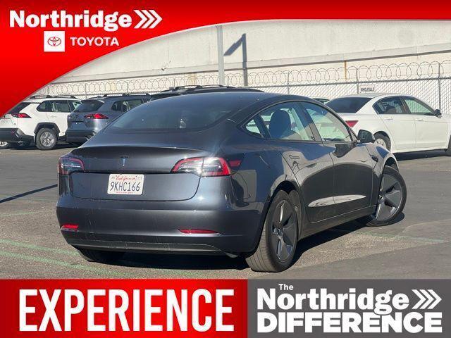 used 2023 Tesla Model 3 car, priced at $33,575