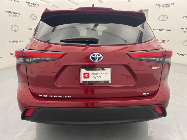 used 2022 Toyota Highlander Hybrid car, priced at $35,350