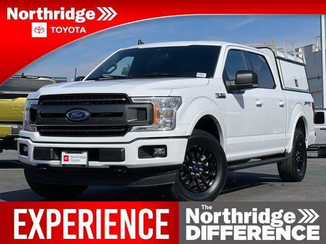 used 2019 Ford F-150 car, priced at $27,950