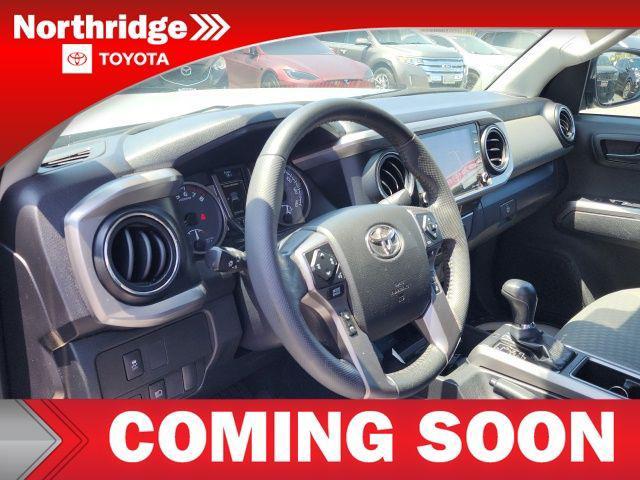 used 2023 Toyota Tacoma car, priced at $30,900