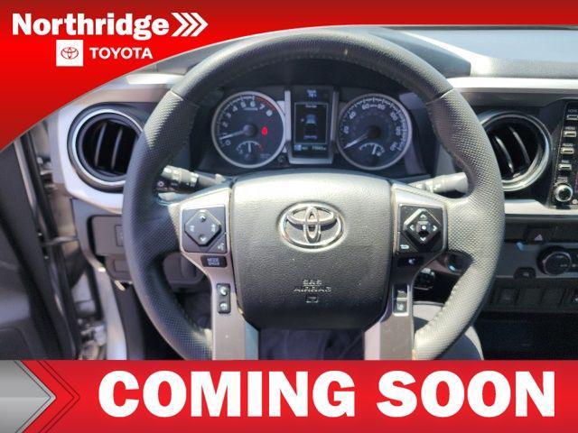 used 2023 Toyota Tacoma car, priced at $30,900