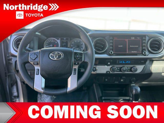 used 2023 Toyota Tacoma car, priced at $30,900