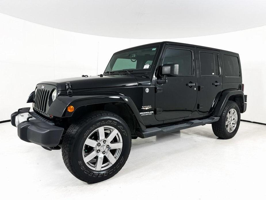 used 2013 Jeep Wrangler Unlimited car, priced at $21,982