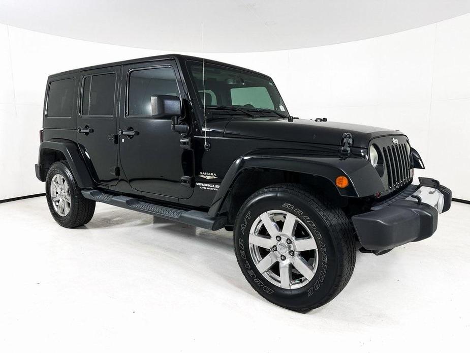 used 2013 Jeep Wrangler Unlimited car, priced at $19,994