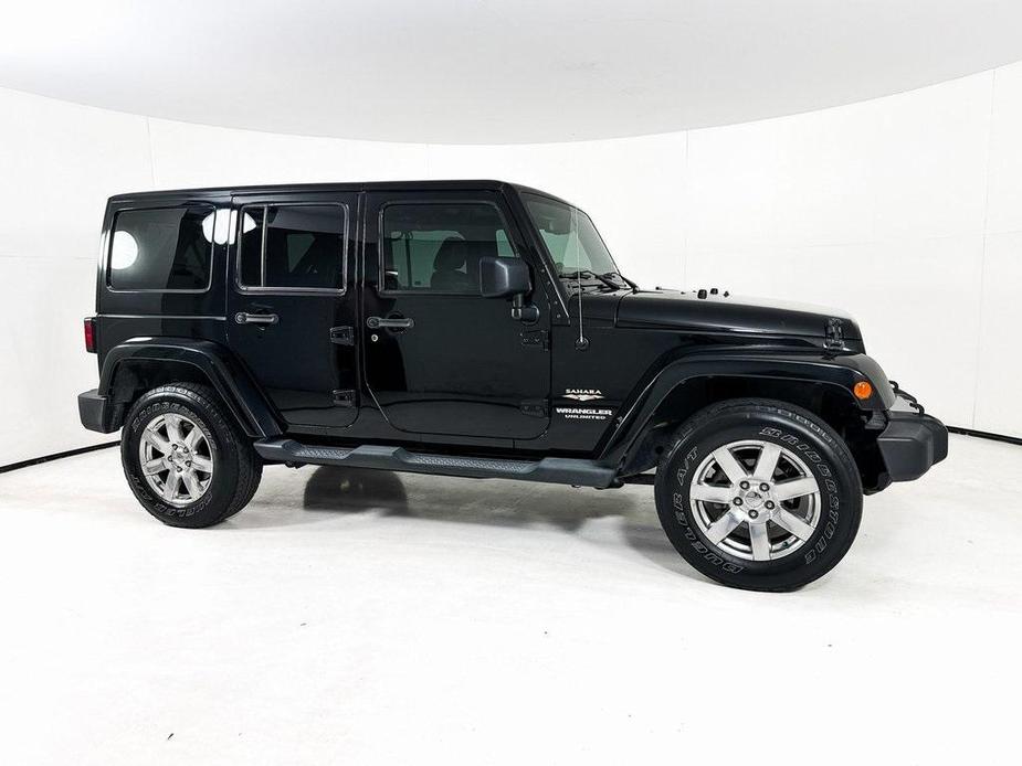used 2013 Jeep Wrangler Unlimited car, priced at $21,982