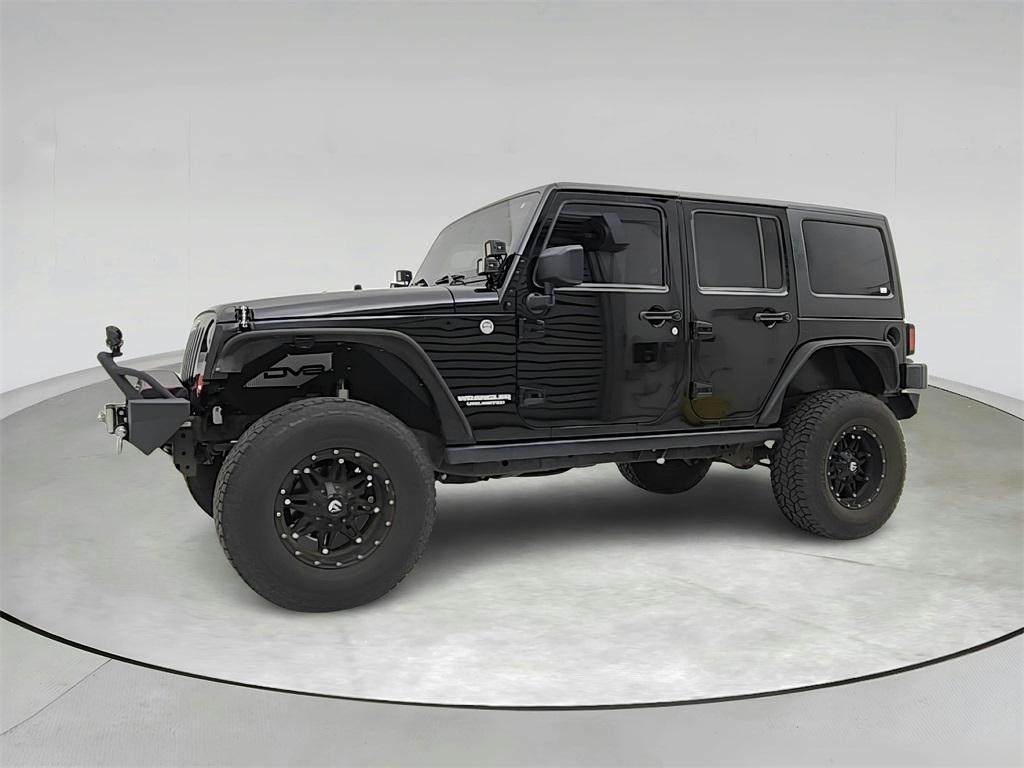 used 2011 Jeep Wrangler Unlimited car, priced at $14,991