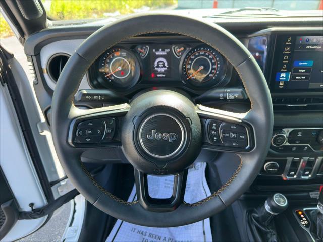 used 2024 Jeep Wrangler car, priced at $33,100