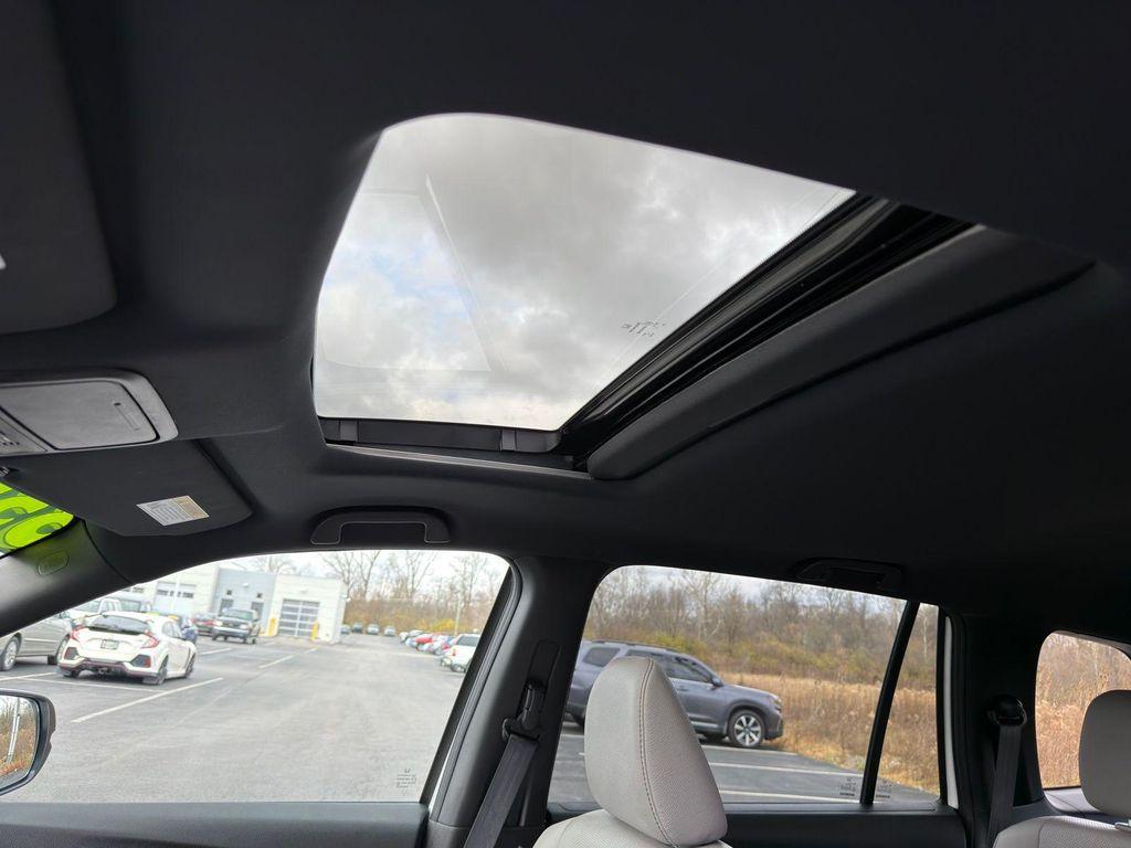 used 2023 Honda Passport car, priced at $33,900