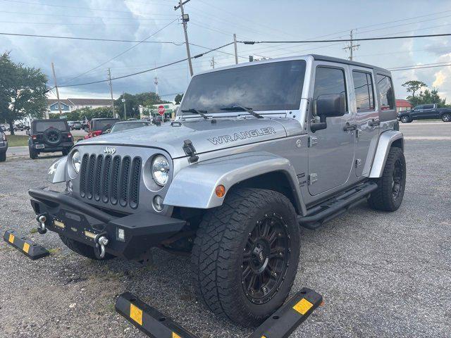 used 2015 Jeep Wrangler Unlimited car, priced at $16,990