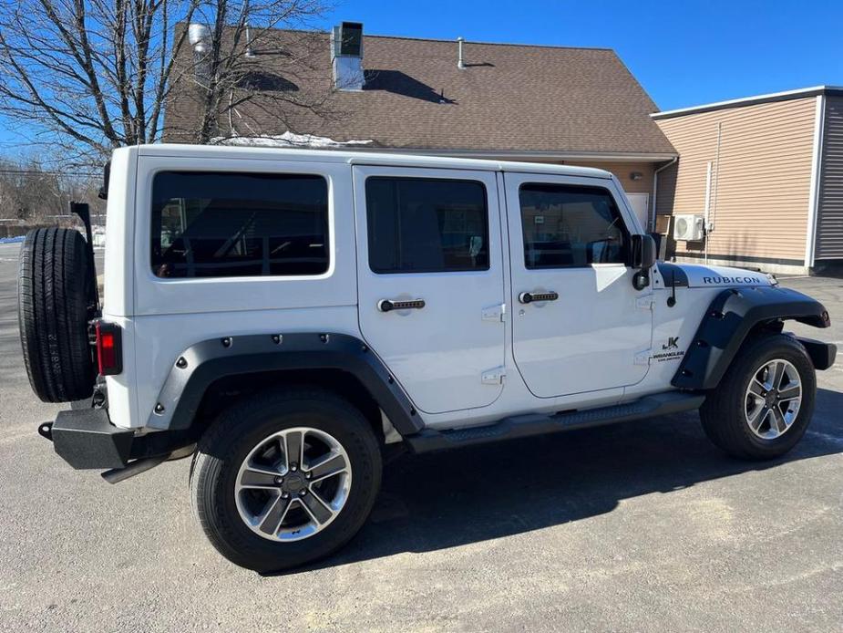 used 2012 Jeep Wrangler Unlimited car, priced at $17,460