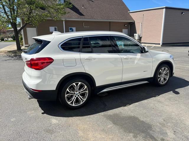 used 2017 BMW X1 car, priced at $14,290