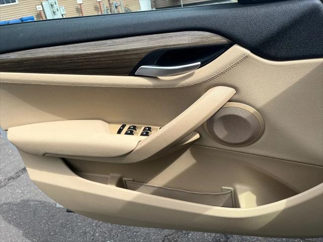 used 2014 BMW X1 car, priced at $8,990