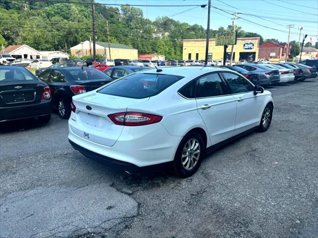 used 2015 Ford Fusion car, priced at $7,000