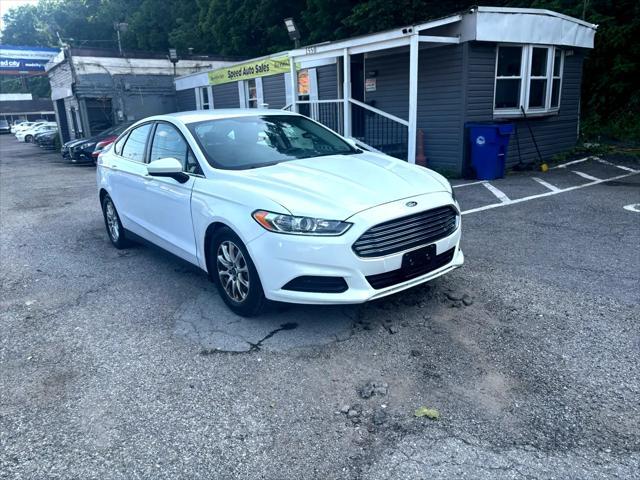 used 2015 Ford Fusion car, priced at $7,000