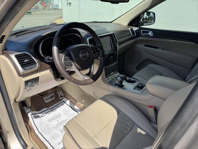 used 2014 Jeep Grand Cherokee car, priced at $14,398