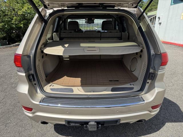 used 2014 Jeep Grand Cherokee car, priced at $14,398