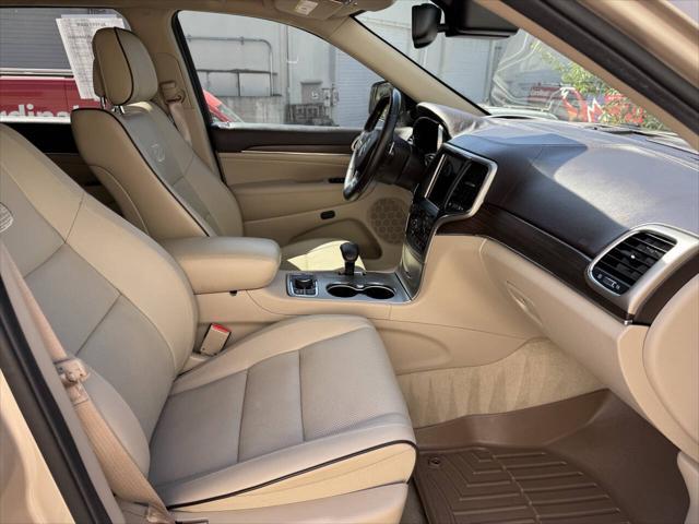 used 2014 Jeep Grand Cherokee car, priced at $14,398