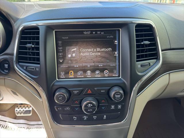 used 2014 Jeep Grand Cherokee car, priced at $14,398