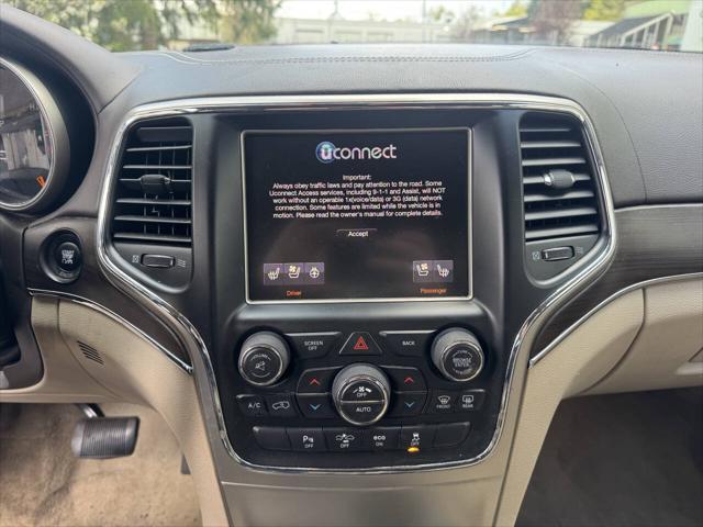 used 2014 Jeep Grand Cherokee car, priced at $16,998