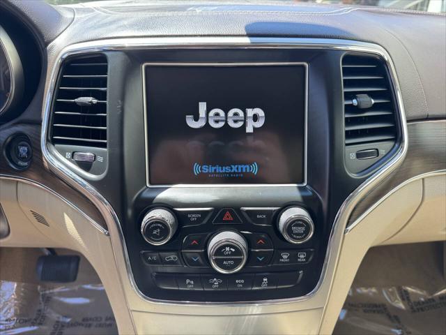 used 2014 Jeep Grand Cherokee car, priced at $10,998