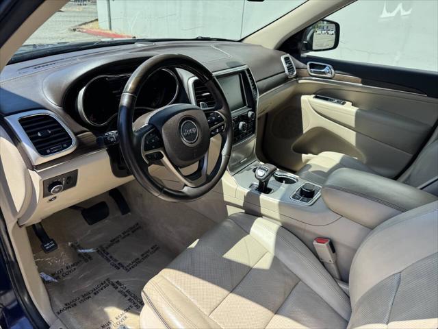 used 2014 Jeep Grand Cherokee car, priced at $10,998