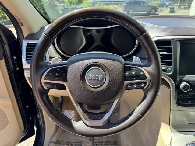 used 2014 Jeep Grand Cherokee car, priced at $10,998