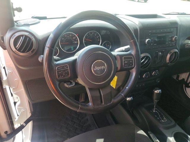 used 2015 Jeep Wrangler car, priced at $17,980