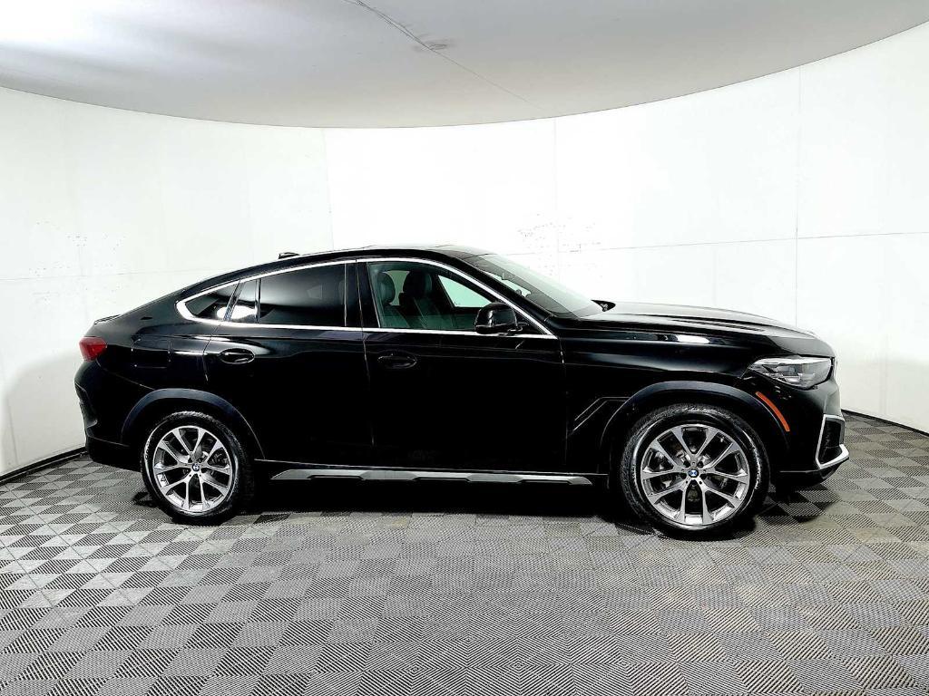 used 2022 BMW X6 car, priced at $56,943