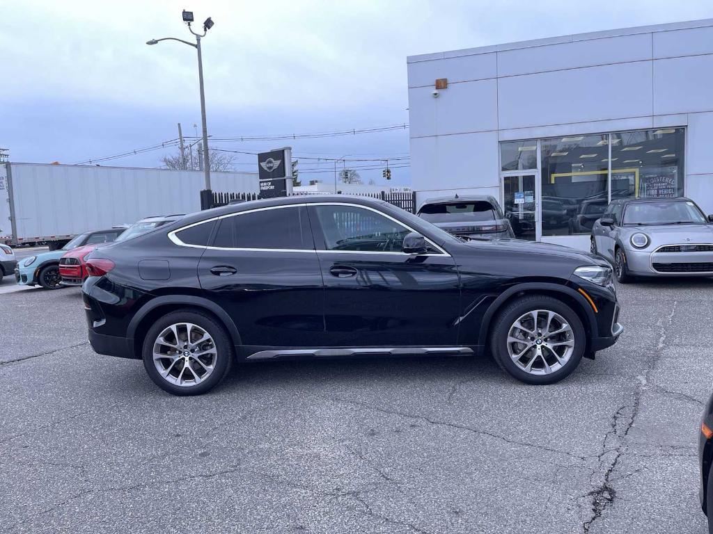 used 2022 BMW X6 car, priced at $56,943