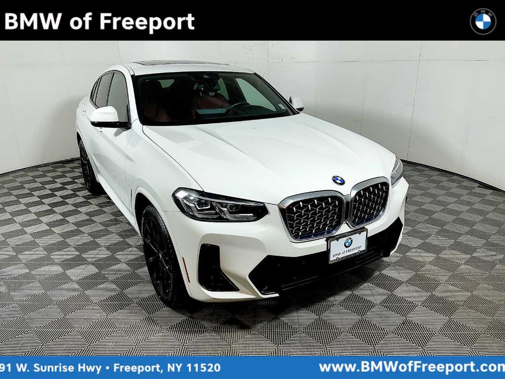 used 2022 BMW X4 car, priced at $42,895