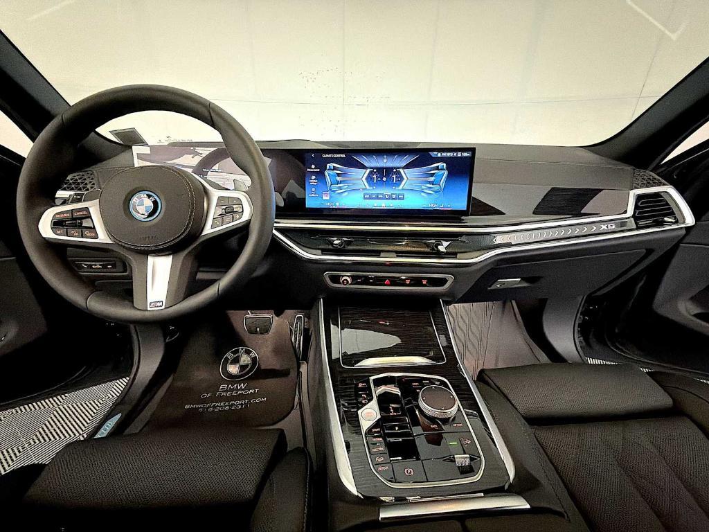 used 2026 BMW X5 PHEV car, priced at $77,943