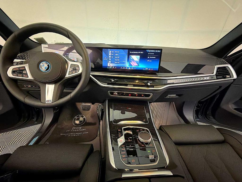 used 2026 BMW X5 PHEV car, priced at $77,943