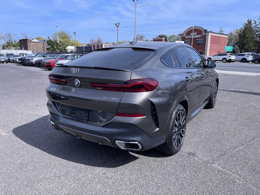 used 2024 BMW X6 car, priced at $69,943