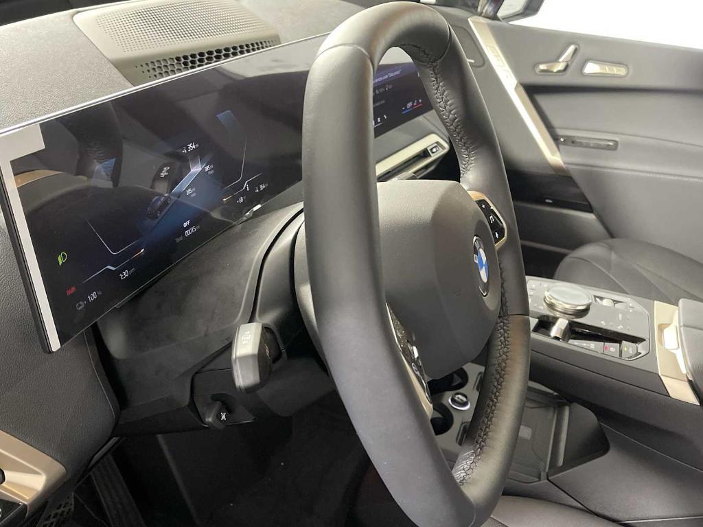 new 2026 BMW iX car, priced at $97,825