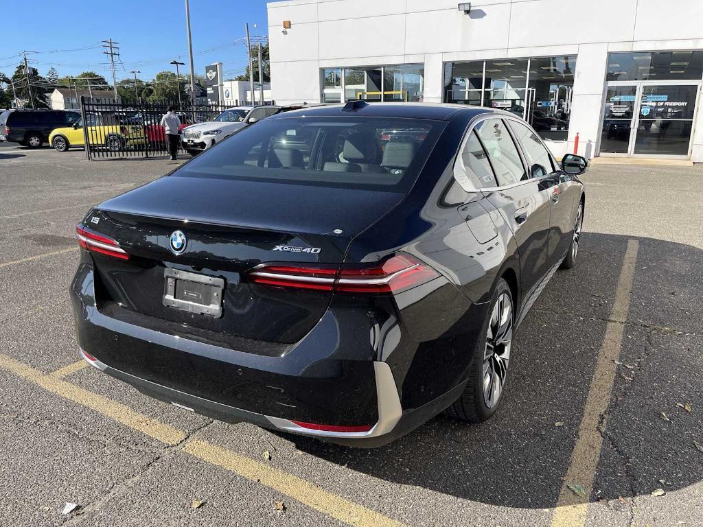 used 2025 BMW i5 car, priced at $56,943