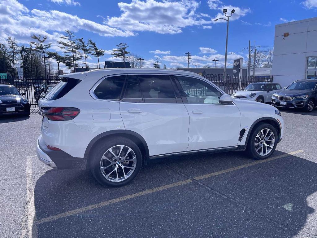 used 2025 BMW X5 car, priced at $68,943