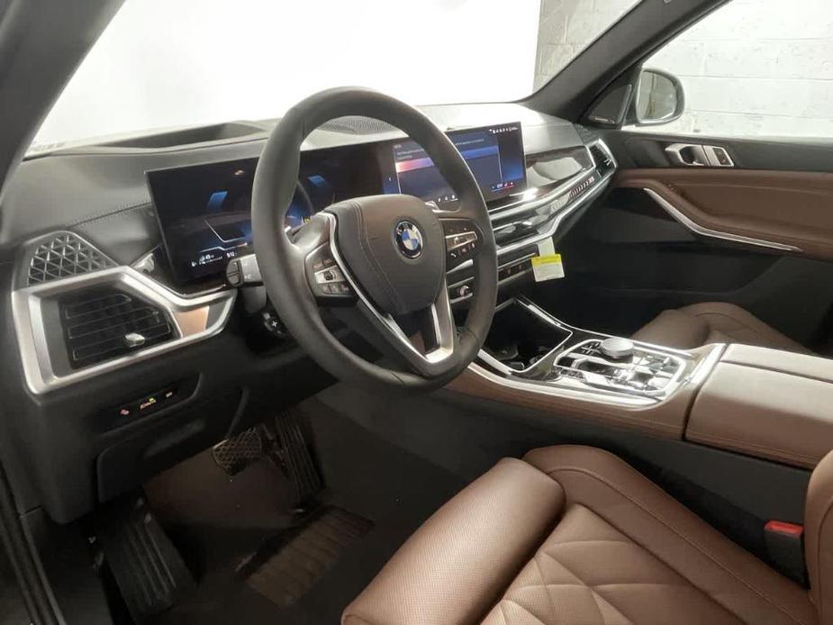 new 2025 BMW X5 PHEV car, priced at $78,125