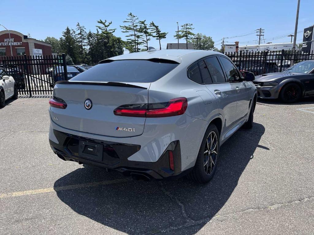 used 2023 BMW X4 car, priced at $59,943