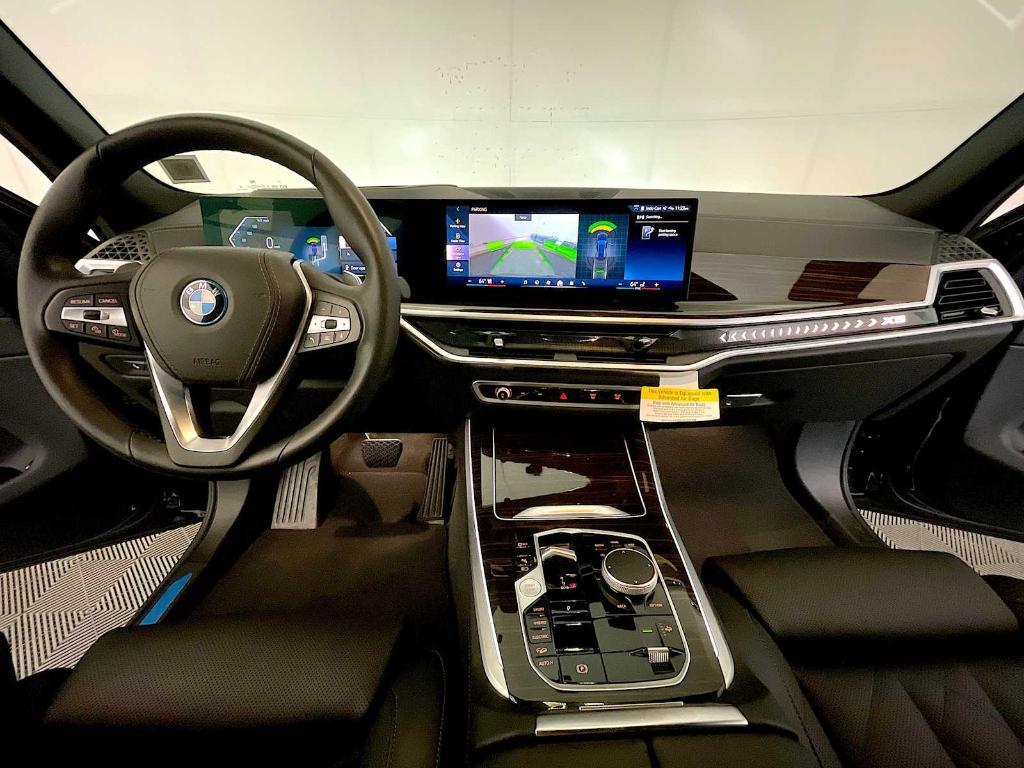 used 2025 BMW X5 PHEV car, priced at $68,943